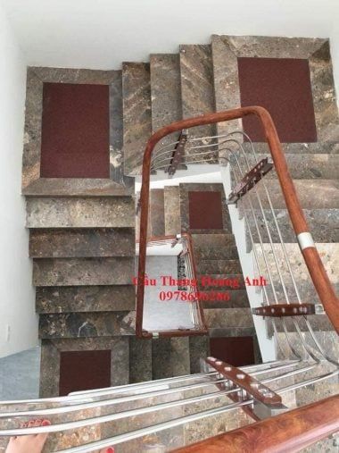 Báo giá cầu thang inox tay vịn gỗ 2022